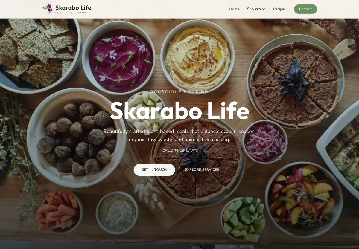 Skarabo Life homepage hero with a food-table background and conscious cooking positioning.